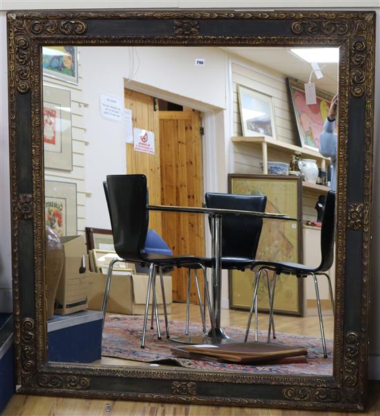A large square wall mirror W.124cm